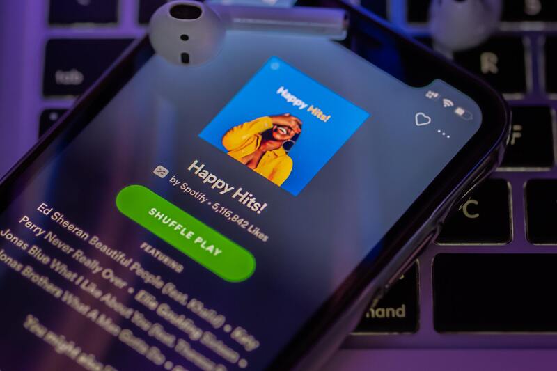 iPhone with a Spotify playlsit