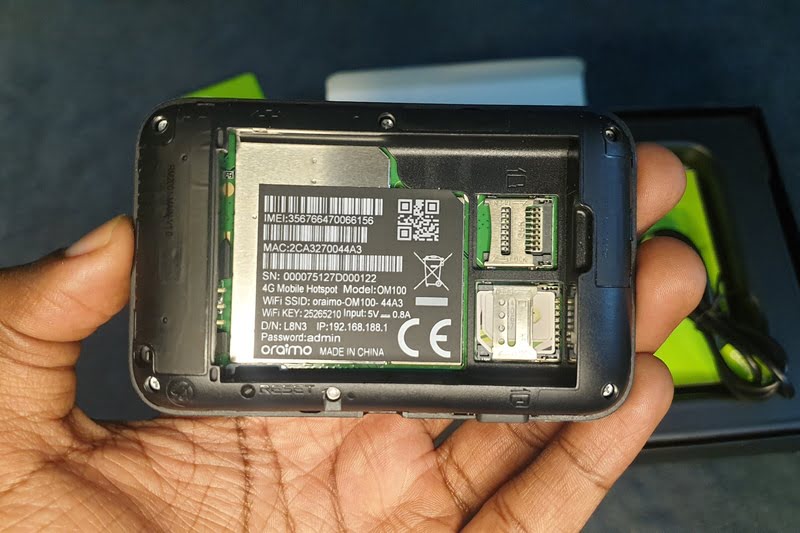 Man holding oraimo mifi router