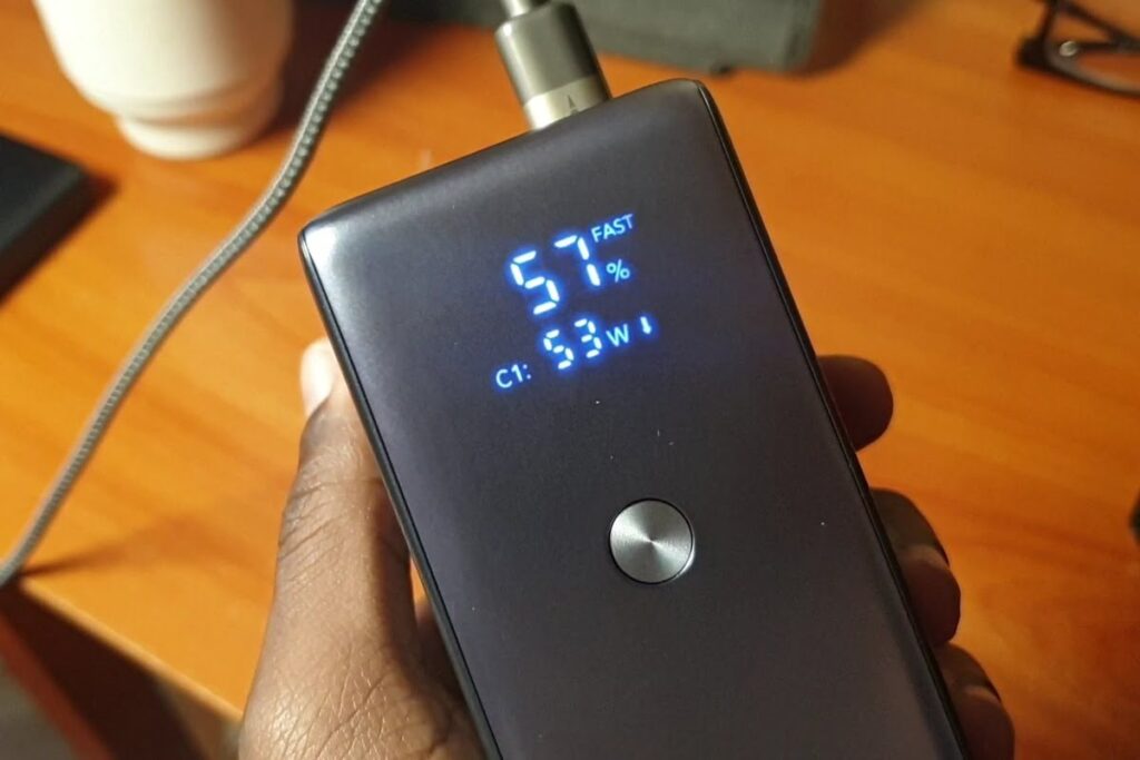 oraimo powerjet 27,600mah powerbank being recharged at 53 watts