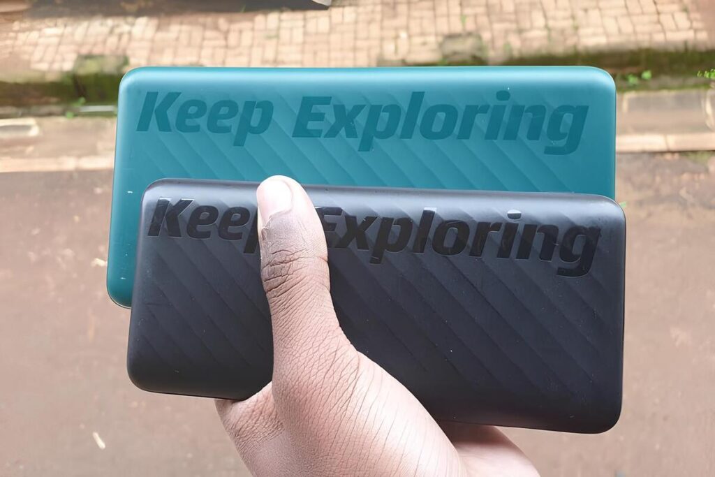 Person holding two power banks