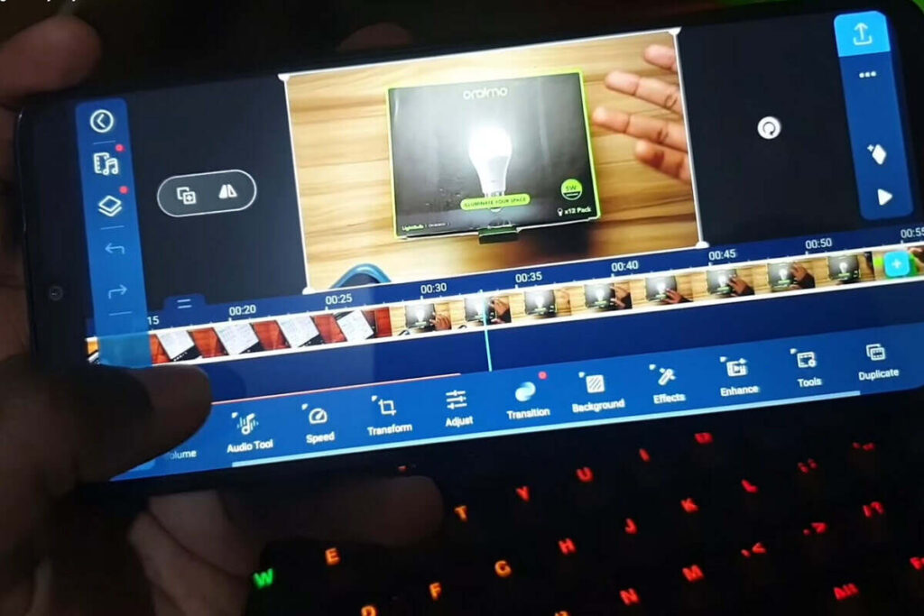 person editing a video on a phone redmi 14c