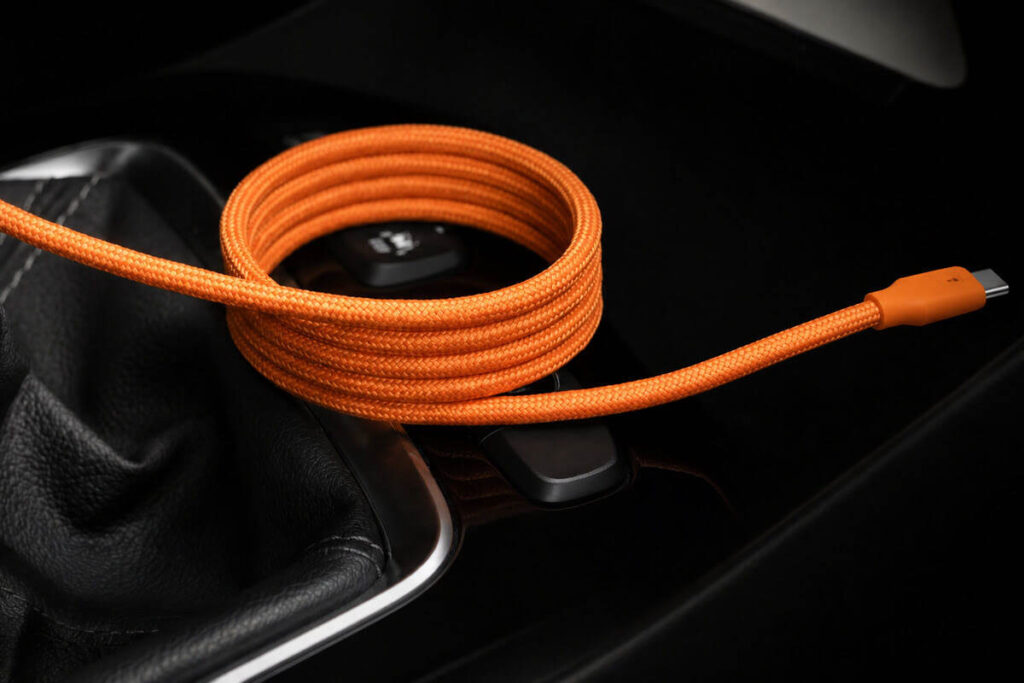 orange usb cable in a car
