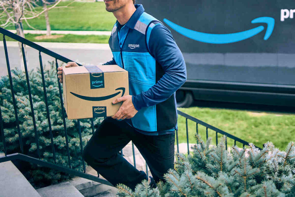 7 Ways Amazon Prime for Young Adults Could Save You Money in 2026 amazon delivery man with a package