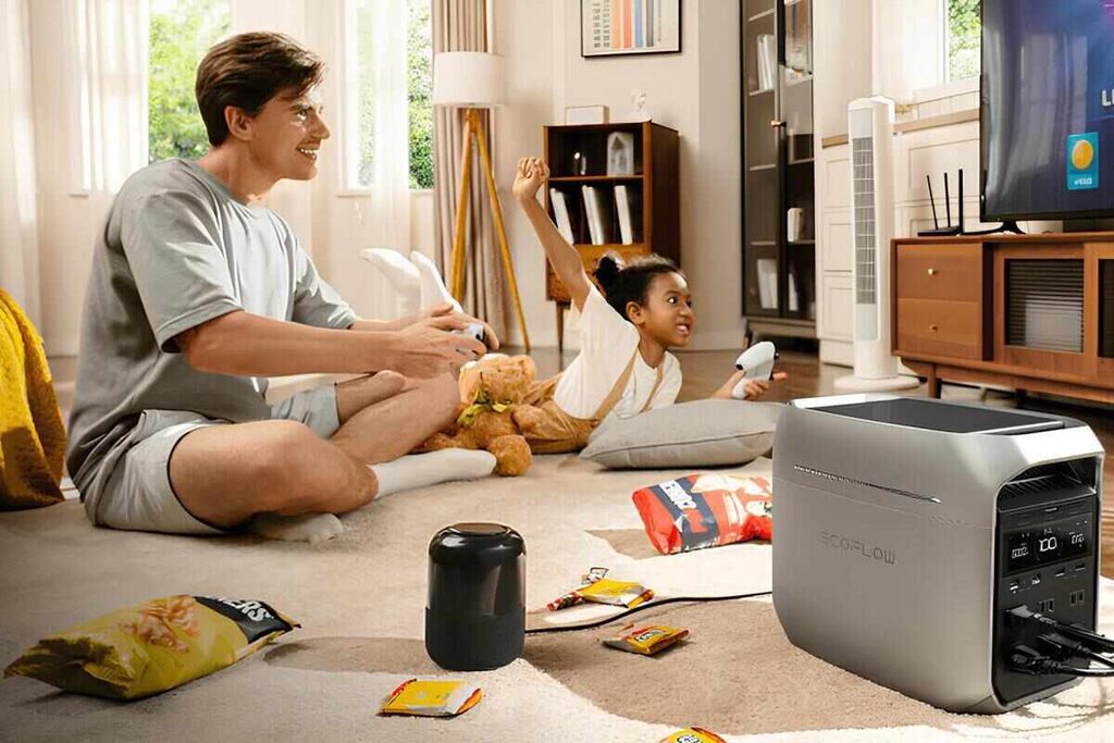 Man gaming on a TV powered by a power station